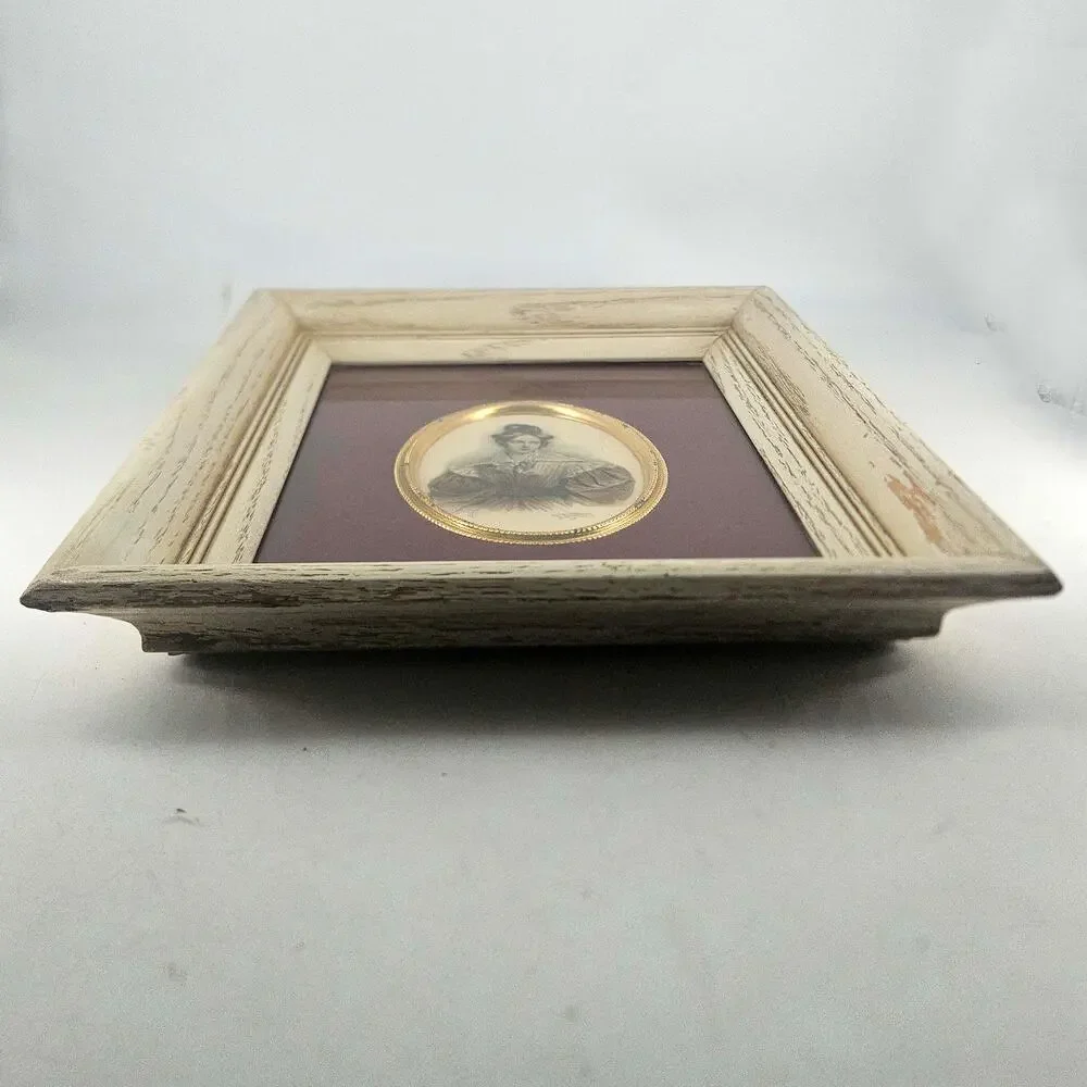 Vintage oval brass detail portrait of lady in deep well distressed white frame
